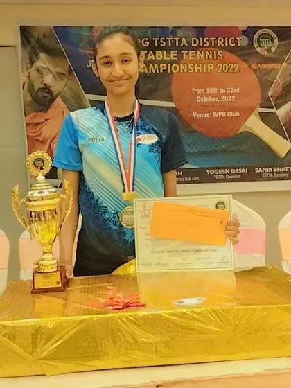 Vaishnavi Jaiswal with her runner-up trophy at the TSTTA district championship 2022, a proud moment for her and the academy.