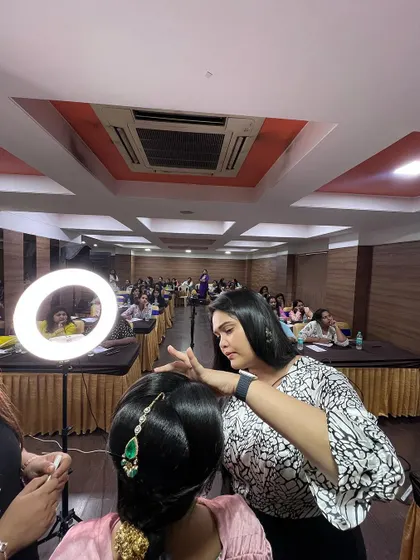 A hairstyling demonstration during the Bangalore masterclass. We cover all aspects of bridal grooming to provide a complete education.