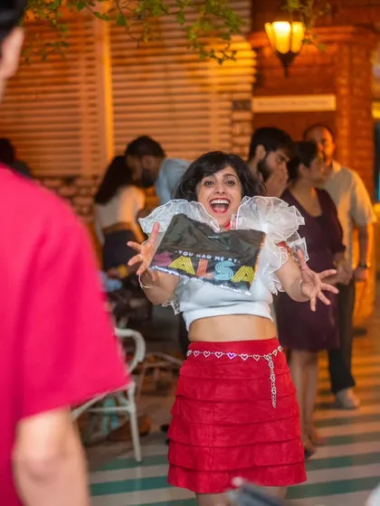 That feeling when the music hits and you can't help but express your joy. A candid shot of one of our students having the time of her life at La Rumba.