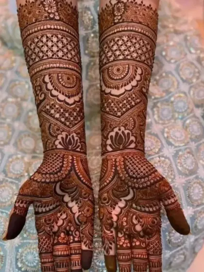 Another view of a full-coverage bridal design, showing the beautiful stain against the bride's ornate dress.