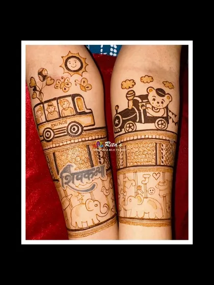Another view of the arms, showing the playful cartoon scenes and the family name 'Shinde' on the bus.