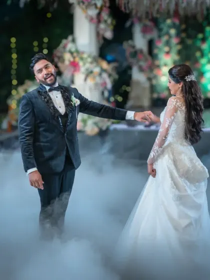 The first dance is always a magical moment. Here, the groom is having a blast, and his energy is just contagious. I love capturing the fun and joy of the wedding reception.