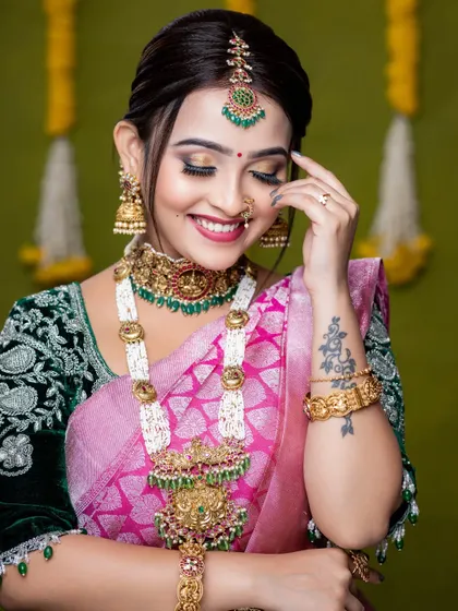 A happy, smiling shot of the model. This look is perfect for a bride who wants something traditional yet unique.