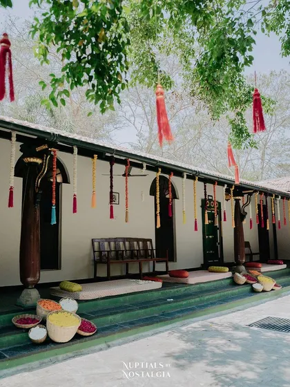 A wide view of the decorated verandah, providing a comfortable and festive area for guests to relax and enjoy the Haldi celebrations.