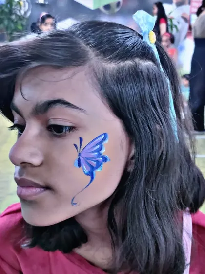 A delicate blue butterfly design, simple, elegant, and always a popular choice.