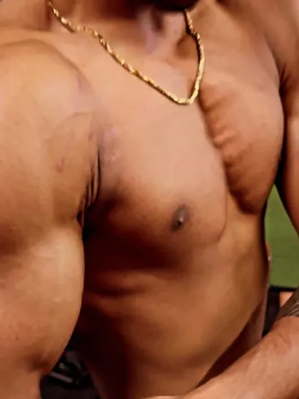 A close-up showing the 12 kilos of solid muscle this client gained. We focused on building quality size and thickness in his chest and arms.