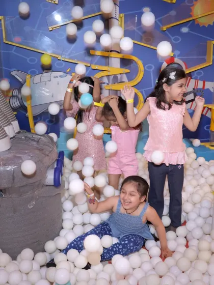 The ball pit doubles as a sensory experience, especially when combined with our ball-launching machines.