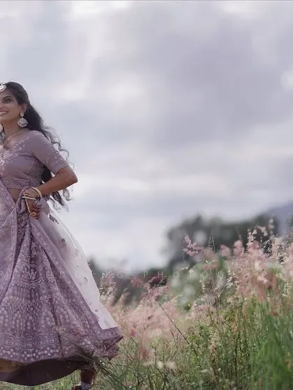 For this outdoor engagement shoot, I created a dreamy, romantic look with soft waves and makeup that enhances the bride's features in the natural light.