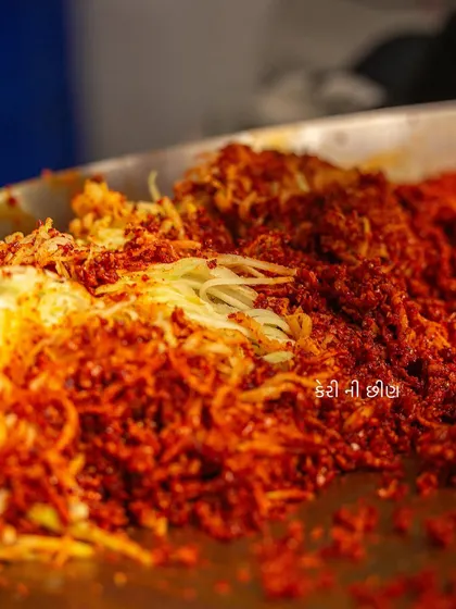 This is the 'keri no chundo', or grated raw mango, that we mix with the stuffed gunda berries. It adds an extra layer of tanginess and texture to the pickle.