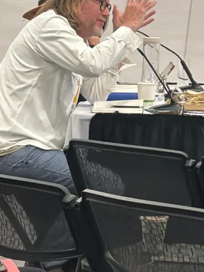 A close-up of a jury member at the World Architecture Festival, deeply engaged in a project presentation. It is in these moments of critical review that architectural excellence is truly tested.