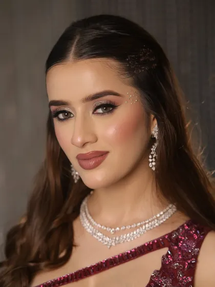 A powerful portrait. The bold nude lip and defined eyes create a look of confidence and allure.