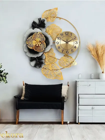 A detailed look at the handcrafted flower clock, showing the layered petals and brushed gold finish that add depth and luxury.