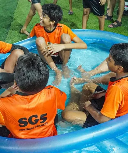 All smiles in the recovery pool. These sessions are not just for physical recovery but also for building camaraderie among the players.