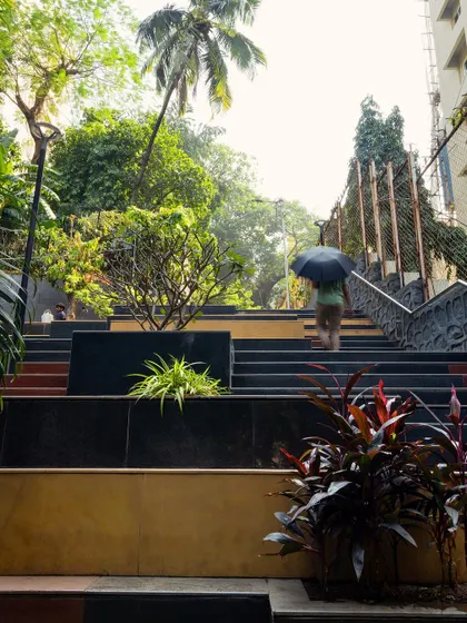 **Nepean Greens, Mumbai:** This image captures the dynamic nature of the stepped plaza, a place for both transit and pause. The design encourages informal interactions and provides a much-needed public space for the local community.