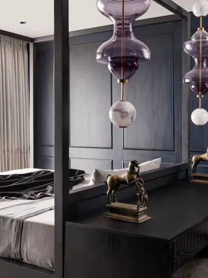 A detail of the custom bed frame and the sculptural horse artifact. We love incorporating our clients' personal objects into the design to make it truly their own.