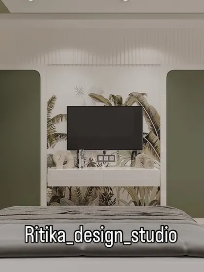 This shot focuses on the floating TV console set against the botanical wallpaper. This design choice creates a beautiful feature wall that brings personality to the room without adding clutter.
