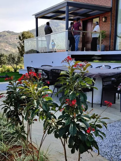 An outdoor deck at our Nandi Hills project, perfect for entertaining. The design prioritizes creating functional outdoor living spaces that take full advantage of the site's natural beauty and climate.