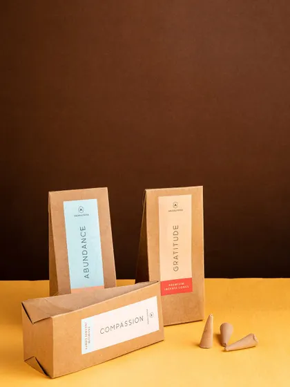 Awaken your senses with the serene aroma of our premium incense cones. This image features our Abundance, Gratitude, and Compassion dhoop cones, perfect for creating a peaceful and positive atmosphere in your home.