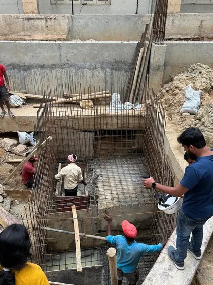 Another angle of the foundation work, showing the steel reinforcement cages. This is the unseen strength of the buildings I create.