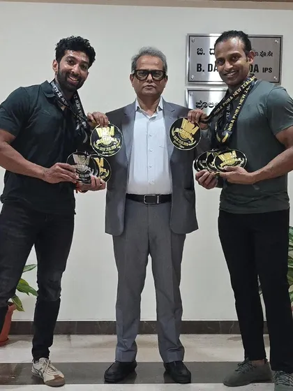 Proudly presenting our medals to the Commissioner. His encouragement means a lot to us.