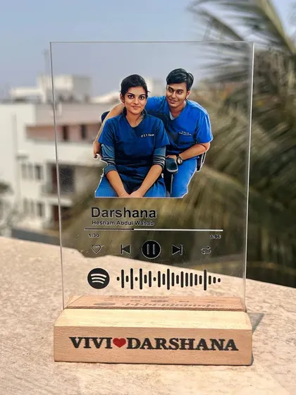 Another example of my personalized Spotify music plaques. This one features a couple's photo and their names engraved on the wooden base.
