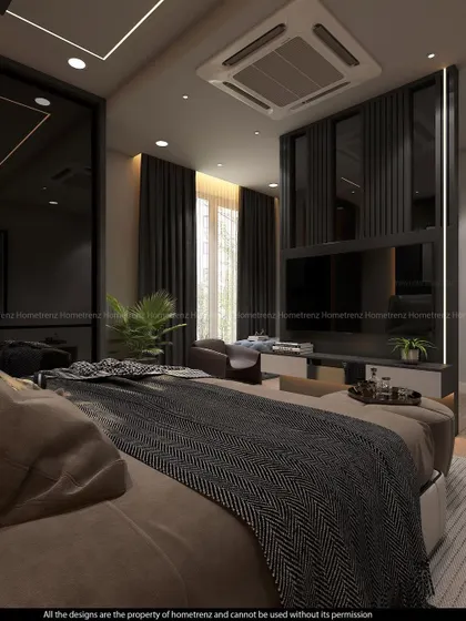 A view from the bed, looking towards the TV and window. The dark curtains and paneling create a cozy, cocoon-like effect.