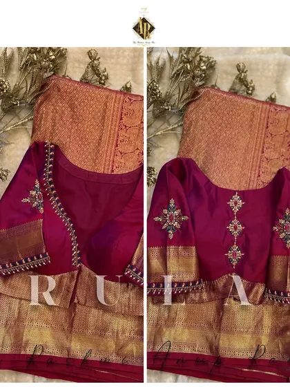 A deep red blouse with a peplum-style cut. The embroidery is placed strategically on the shoulders and waist to create a flattering silhouette.
