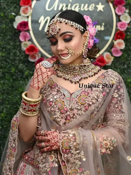A beautiful close-up of the bride's final look. The intricate details of the choker and nath are clearly visible, showcasing the quality of the bridal jewellery I offer for rent.