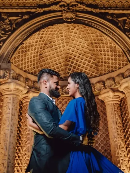 A close up of the couple from the evening shoot, with the rich blue fabric of the gown adding to the romantic mood.
