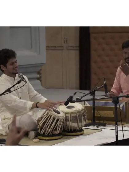 Sharing a smile with my harmonium accompanist. The lehra player is essential in a tabla solo for maintaining the melodic framework of the rhythmic cycle.