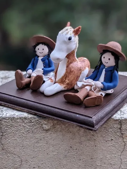 Another angle of the horse and riders birthday cake topper. Creating these narrative scenes is one of my favorite things to do, as they tell a complete story.