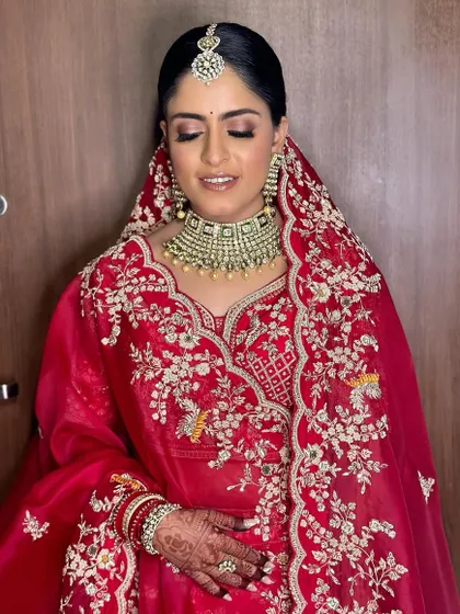 A serene moment captured. The soft, shimmery eye makeup looks beautiful whether the eyes are open or closed.