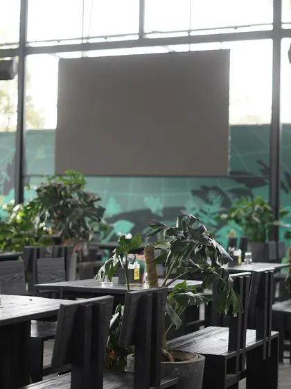 A view of our giant screen, where we host live sports and movie screenings.