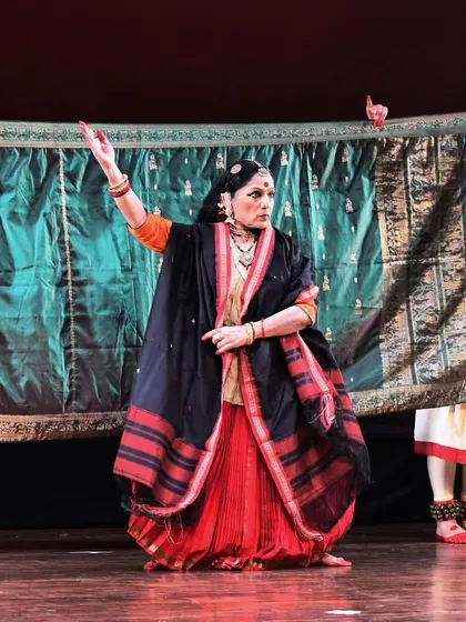 Here, I am performing a segment of 'Mix & Match', using a traditional saree as a prop to tell a story. Each textile in the production carries its own history and cultural significance, which we explore through dance.