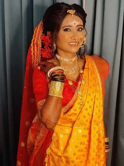 Priyanka showcasing her 'shakha pola' bangles, a symbol of a married Bengali woman.