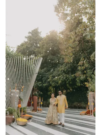 A couple's grand entrance on our striped walkway, a modern and stylish start to their celebration.