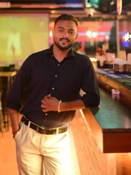 Another angle from the same shoot, capturing a confident and relaxed look. It's all about carrying the right energy.