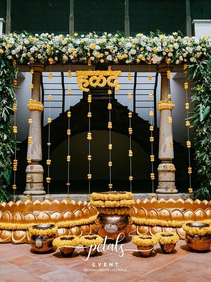 A full view of the Haldi setup, capturing the grandeur and intricate details of the design. This space is ready for a joyous and colorful ceremony.