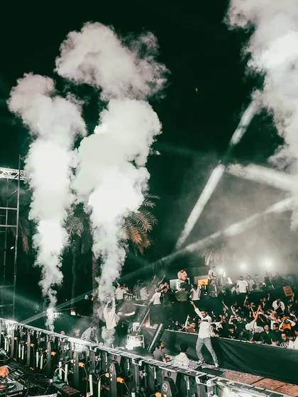 The stage engulfed in CO2 smoke, a signature part of my high-energy sets that always gets the crowd hyped.