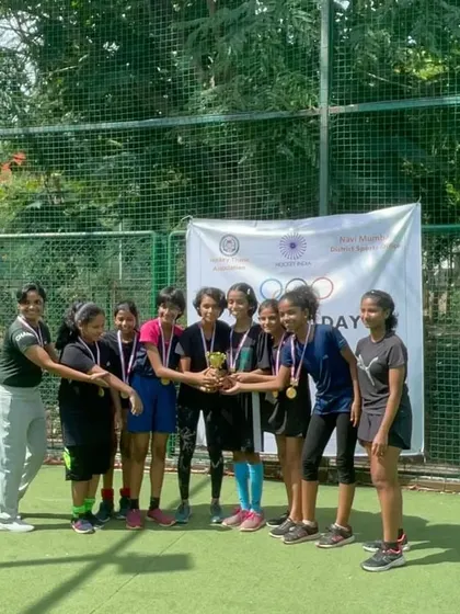 Another victorious girls' team from the Olympic Day Event. We are committed to providing equal opportunities for our female players to compete and succeed.