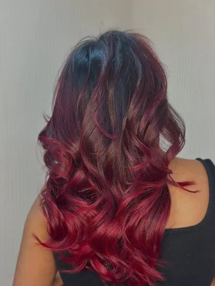 The side view shows how the red tones are blended into the dark base for a seamless transition.