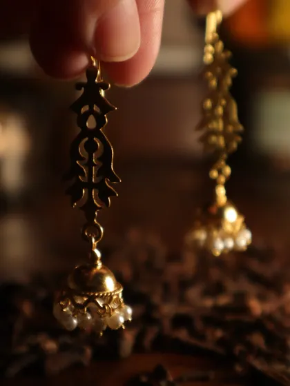 A closer look at the intricate design of my pearl jhumkas. Tradition and play come together when you are truly yourself.