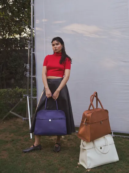 Our Carryall totes in three stunning colors: Parisian Blue, Pebbled Terra, and Pebbled White. These giant totes are perfect for the season, offering room for layers, memories, and moments.