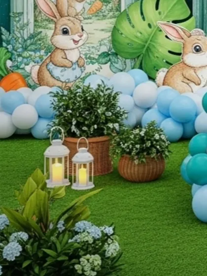A close-up of the ground-level decor, featuring wicker baskets with greenery and glowing lanterns. These elements add texture and warmth to the base of the main stage setup.