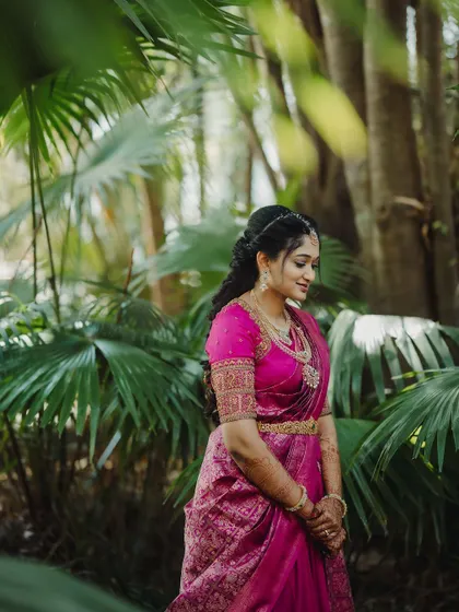 Surabhi looking serene amidst lush greenery. This photo beautifully captures the elegance of her Varapooja look.