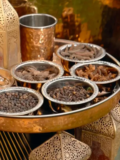 The foundation of our authentic flavors lies in the quality of our spices. We use a traditional blend of whole spices like star anise, cloves, and black pepper to create our signature masalas.