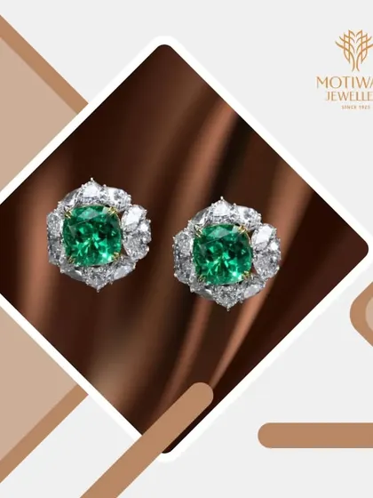 Classic and luxurious, these stud earrings feature magnificent cushion-cut emeralds surrounded by a halo of brilliant diamonds. They are a timeless investment in elegance.