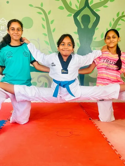 Teamwork makes the dream work. Three of my students collaborate to showcase their amazing flexibility.