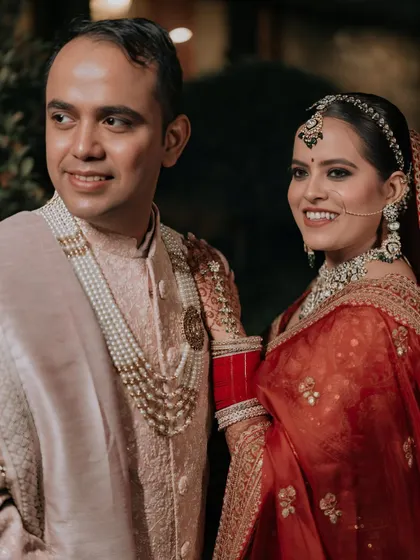 A heartwarming photo of the bride and groom. Her makeup looks flawless and natural, perfect for creating cherished memories.
