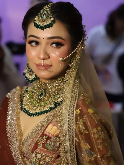 A full-length shot of the bridal look created at the beauty expo. The lehenga and jewelry are from my own couture rental collection.